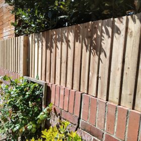 Post and rail type fencing, erected on top of wall for extra privacy.
: Click Here To View Larger Image