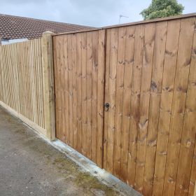 Fencing replaced and new gates installed. Creating cleaner look to property.: Click Here To View Larger Image