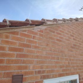 This bungalow needed ridge tiles repointing. All old cement was hacked out. New fibre boards were put in and then repointed.: Click Here To View Larger Image